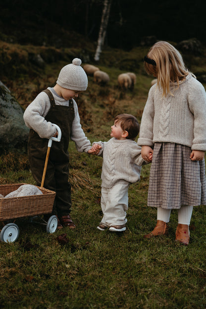 Anna b Official | Bjork Unisex Strikket Ullgenser Mini - Beige Melange